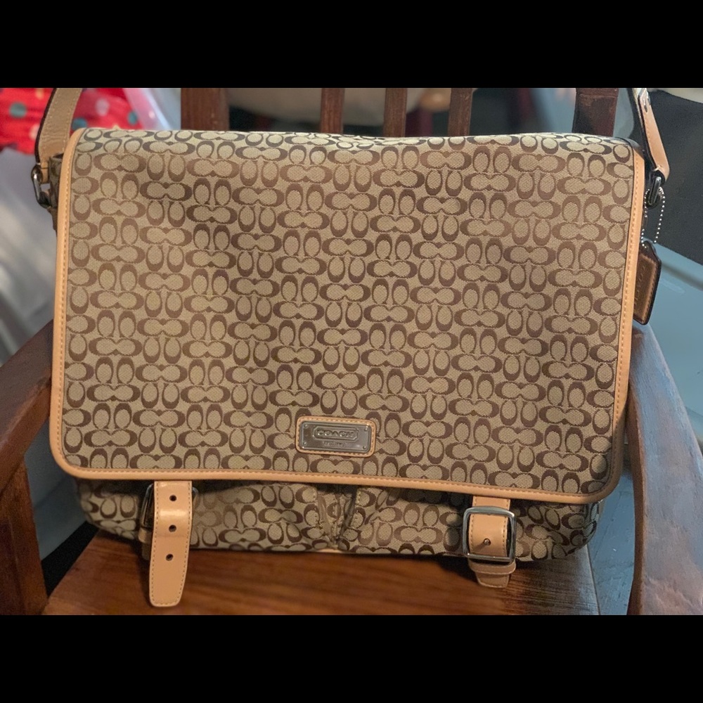 Coach logo imprinted diaper bag